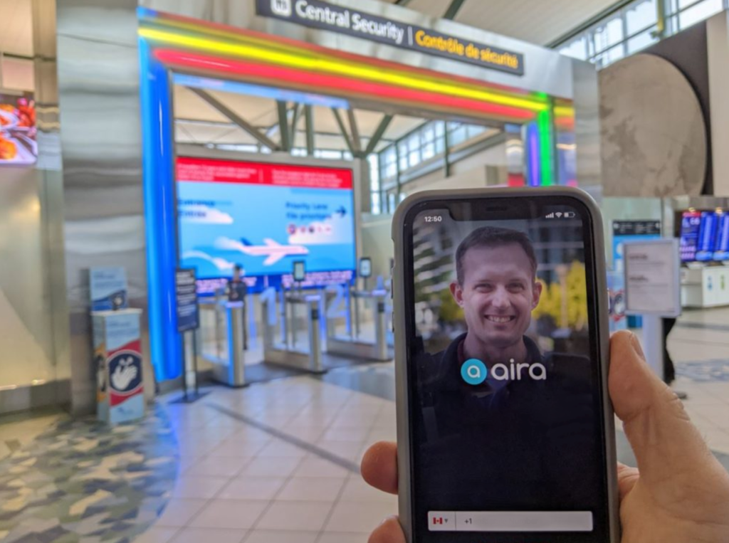 A phone showing the AIRA app near Central Security at Edmonton International Airport
