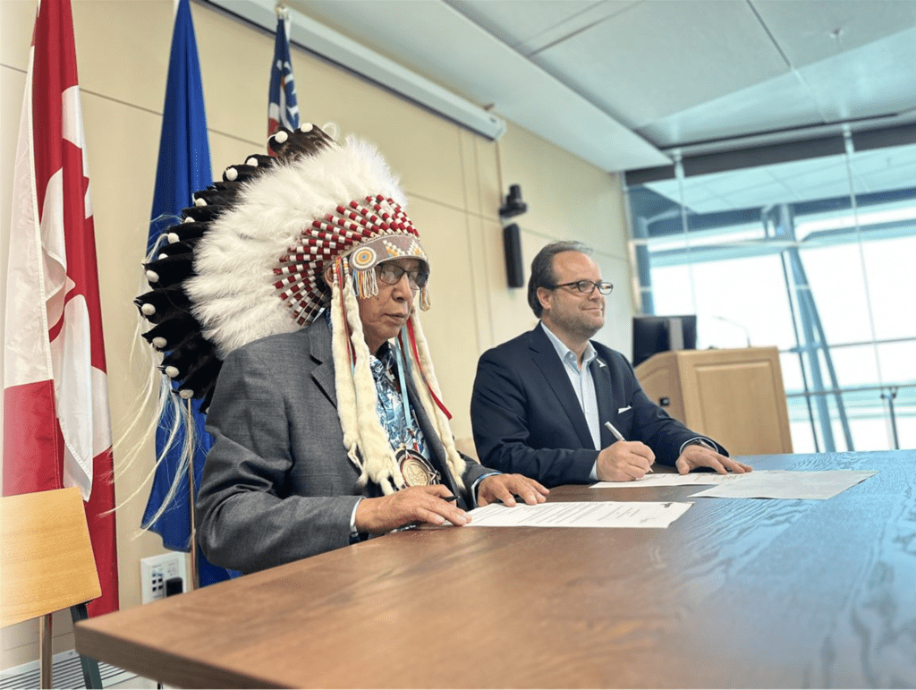 Myron Keehn, CEO of Edmonton International Airport (YEG), and Grand Chief Leonard Standingontheroad of the Confederacy of Treaty Six First Nations