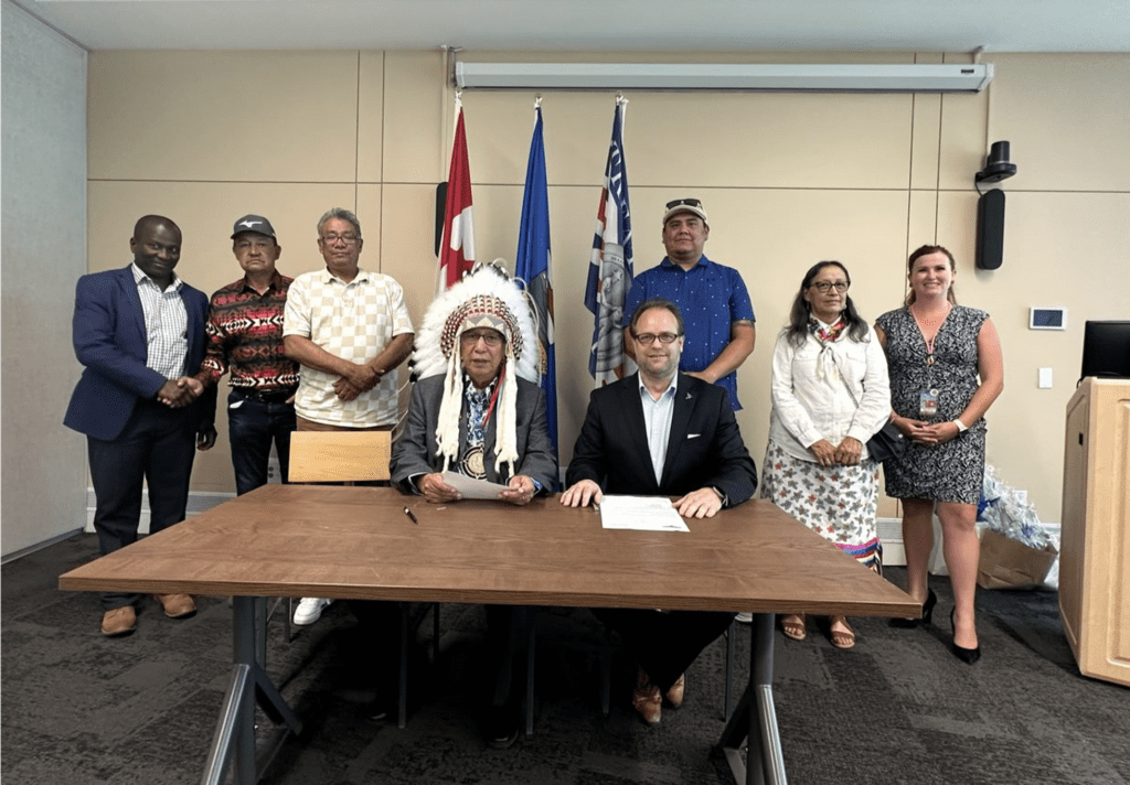 Representatives from Montana First Nation and YEG in a group photo celebrating the signing of the MOU between Edmonton International Airport and Montana First Nation.